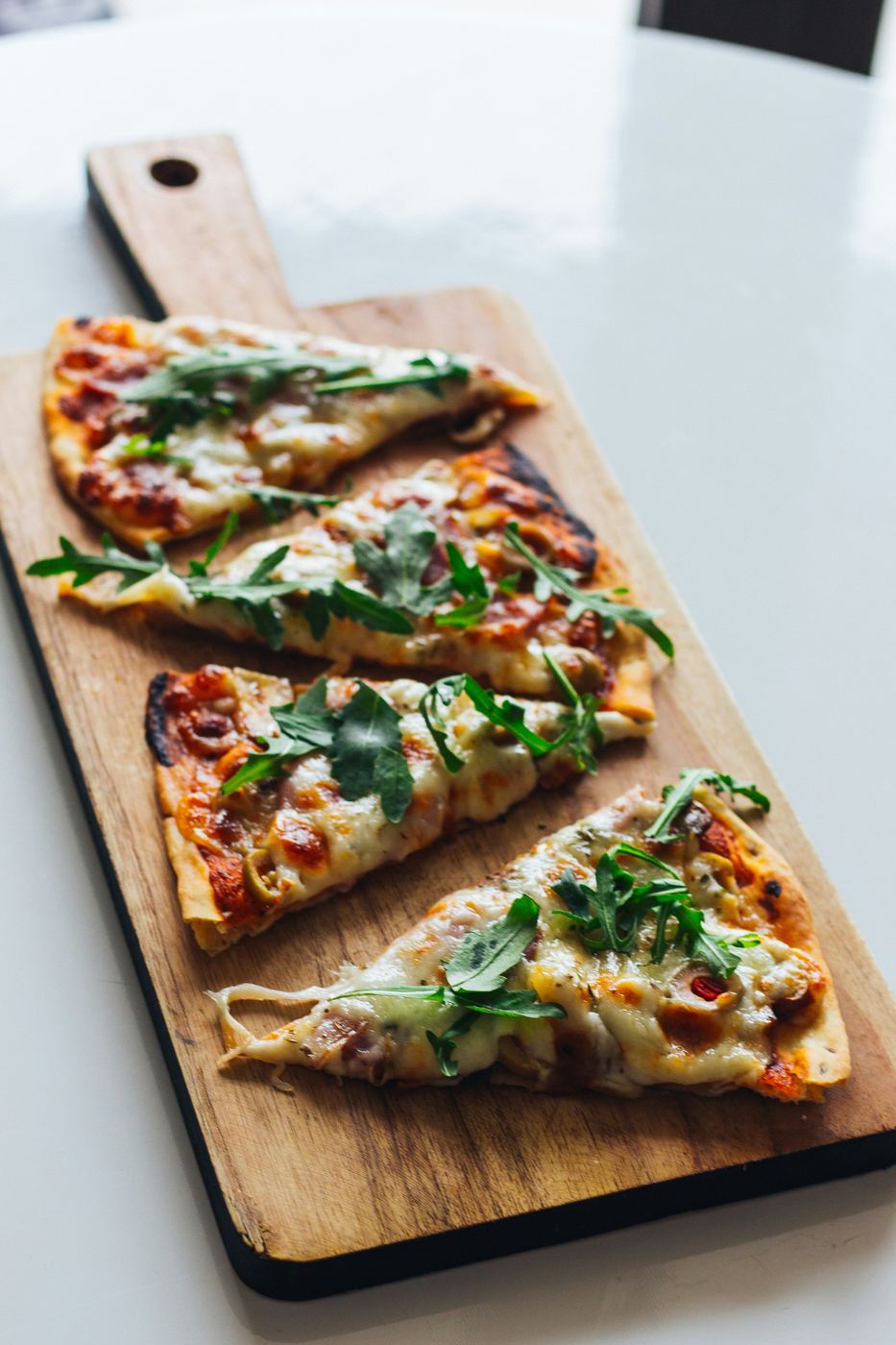 Pizza a fette con rucola
